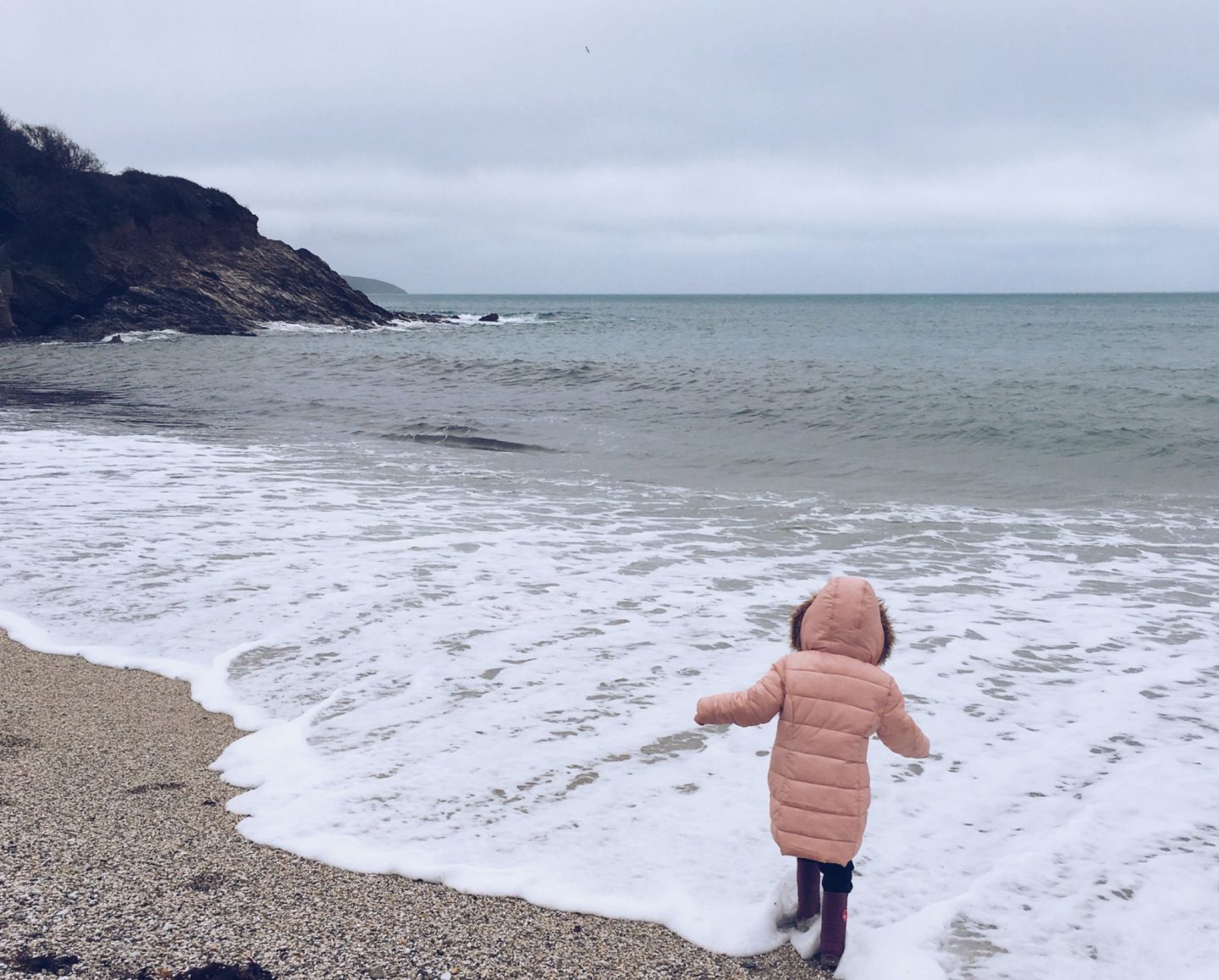 Child sea Cornwall winter